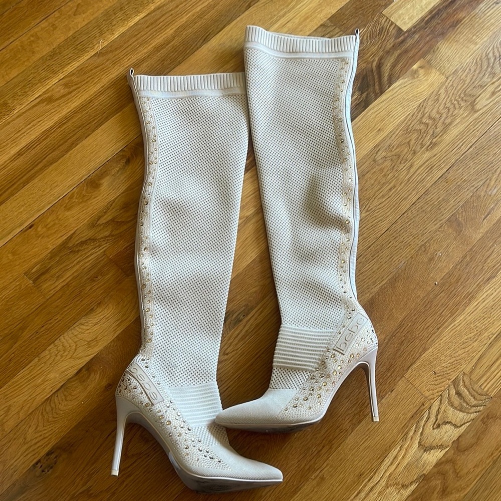 Warn one time 
Size 9 over the knee beige high heel boots